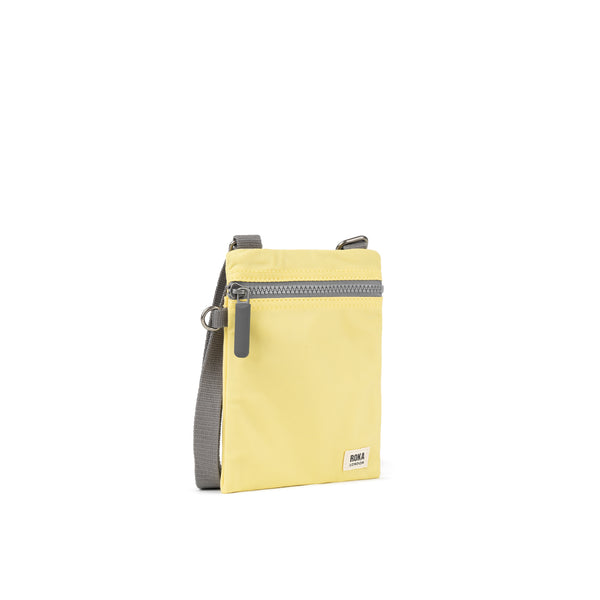 Roka London Chelsea Pocket Sling Bag In Citron