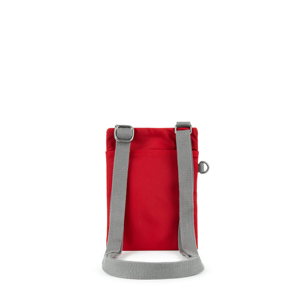 Roka London Chelsea Pocket Sling Bag In Cranberry