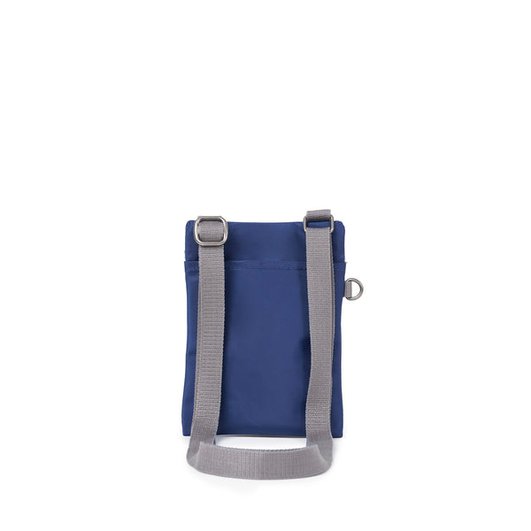 Roka London Chelsea Pocket Sling Bag In Crisp Blue