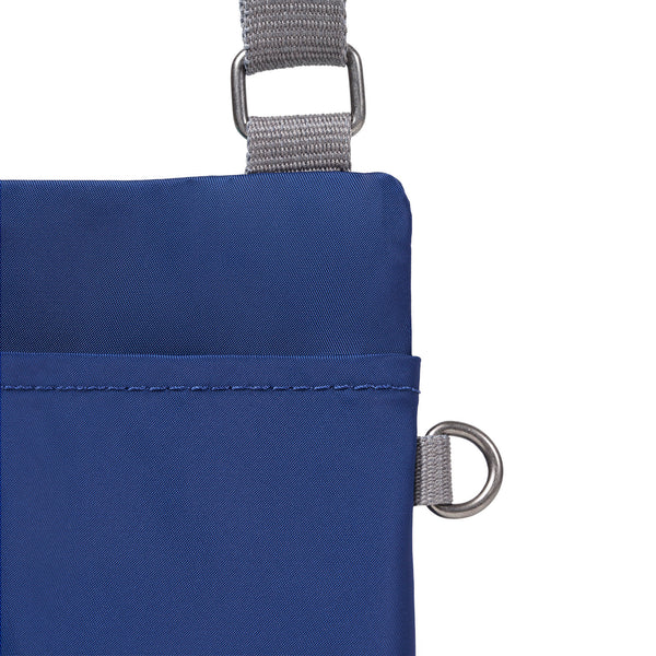 Roka London Chelsea Pocket Sling Bag In Crisp Blue