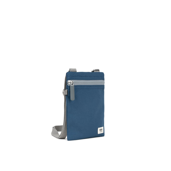 Roka London Chelsea Pocket Sling Bag In Deep Blue