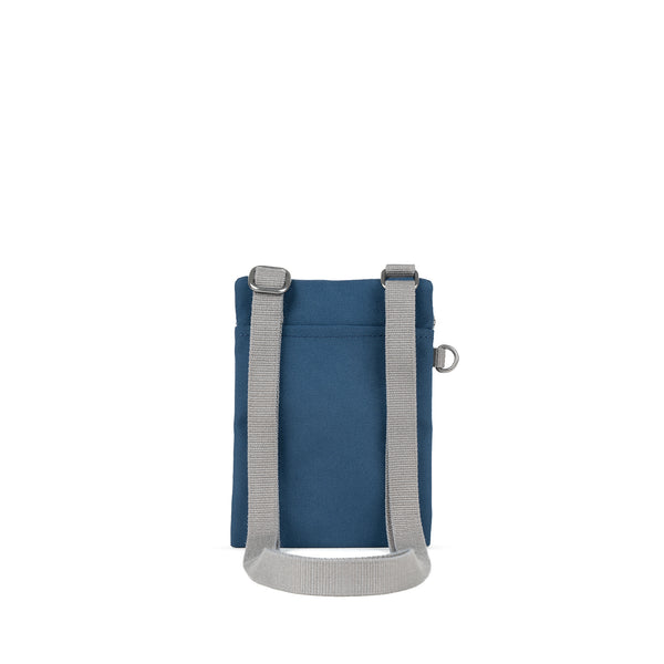 Roka London Chelsea Pocket Sling Bag In Deep Blue