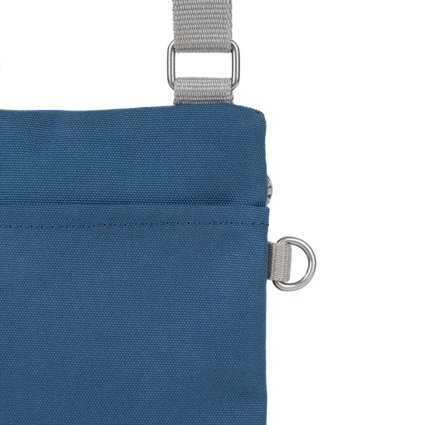 Roka London Chelsea Pocket Sling Bag In Deep Blue