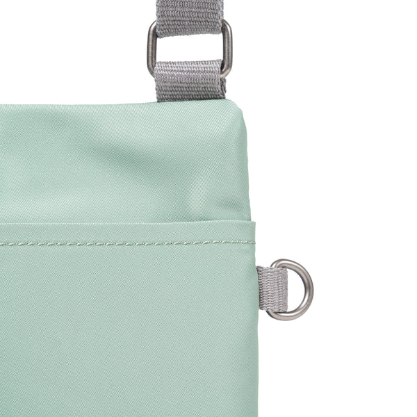 Roka London Chelsea Pocket Sling Bag In Frost