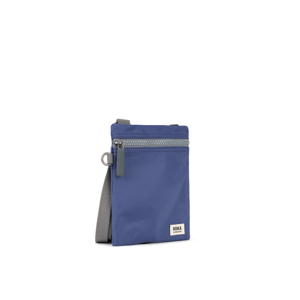 Roka London Chelsea Pocket Sling Bag In Indigo