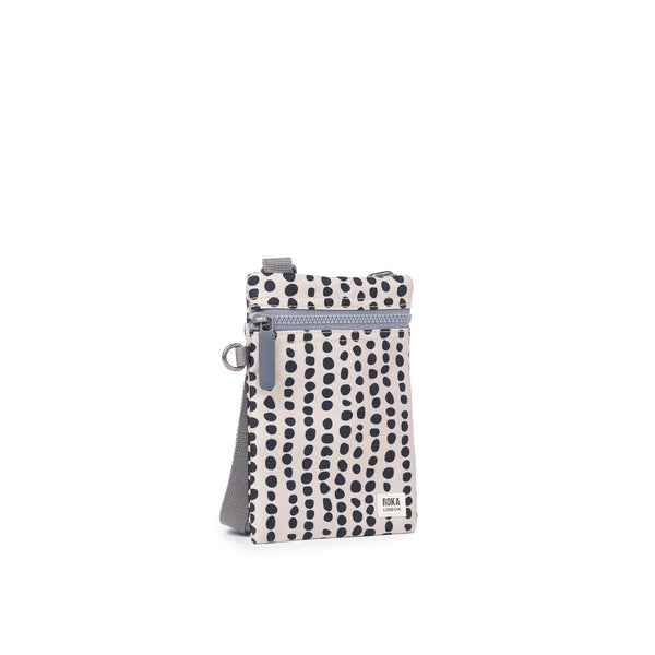 Roka London Chelsea Pocket Sling Bag In Linear Dot