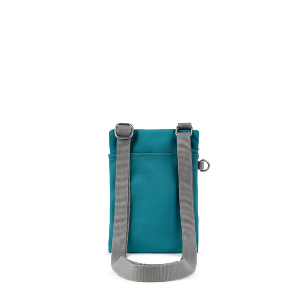 Roka London Chelsea Pocket Sling Bag In Marine