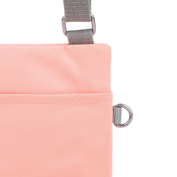Roka London Chelsea Pocket Sling Bag In Punch