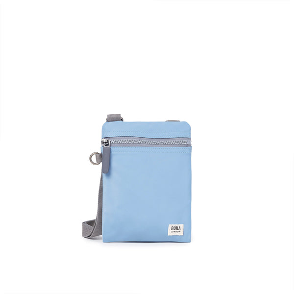 roka london Chelsea Pocket Sling Bag in Retro Blue
