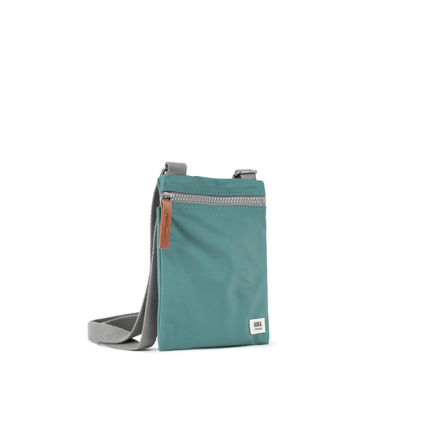 Roka London Chelsea Pocket Sling Bag In Sage