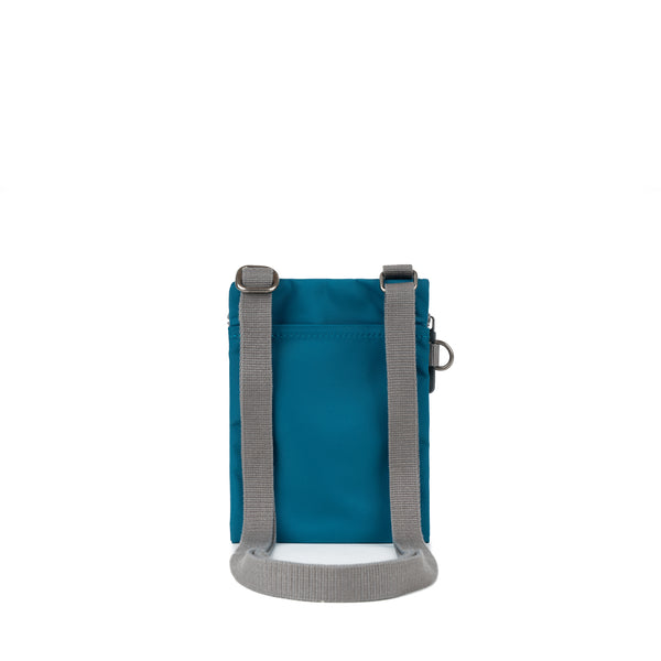 Roka London Chelsea Pocket Sling Bag In Sapphire