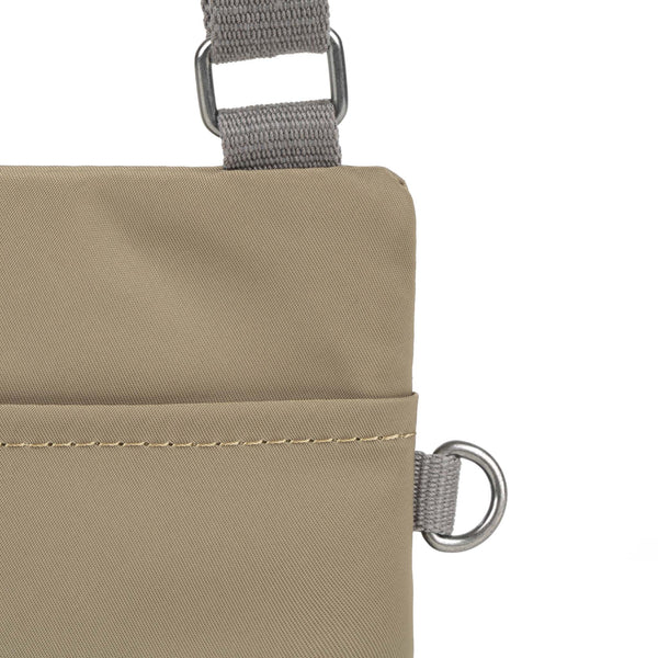 Roka London Chelsea Pocket Sling Bag In Taupe