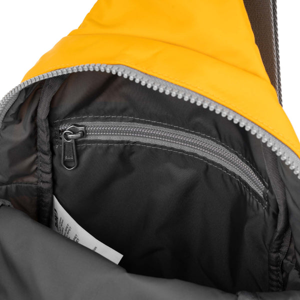 Roka London Willesden Sling Bag In Saffron