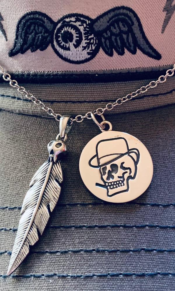 Rum Knuckles Raven Feather Pendant