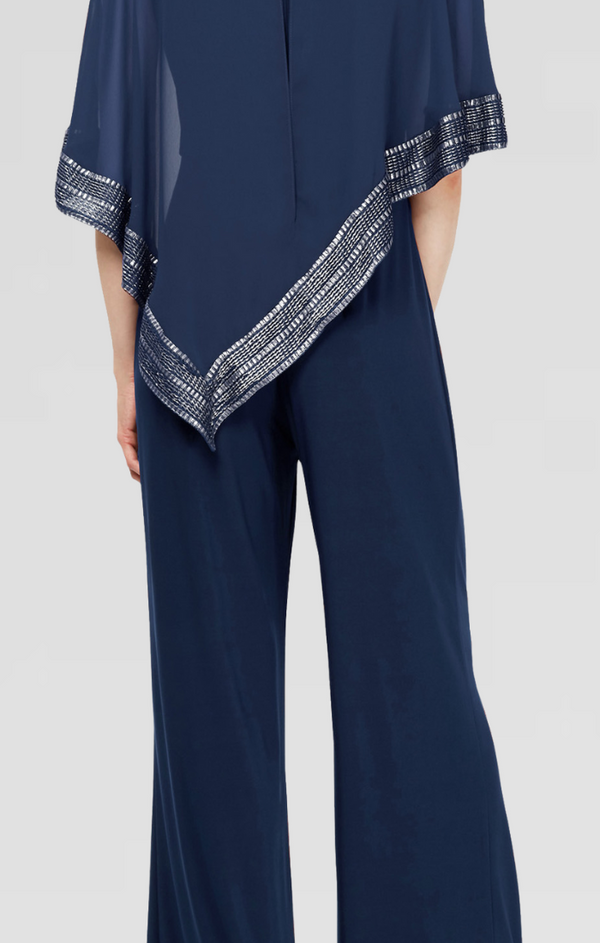 S.L. Fashions Jersey Jumpsuit With Asymmetrical Chiffon Cape With Foil Trim