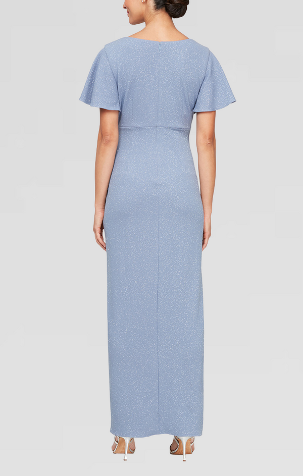 S.L. Fashions Long Empire Waist Dress With Surplice Neckline Flutter Sleeves Embellishment Detail At Hip And Cascade Skirt