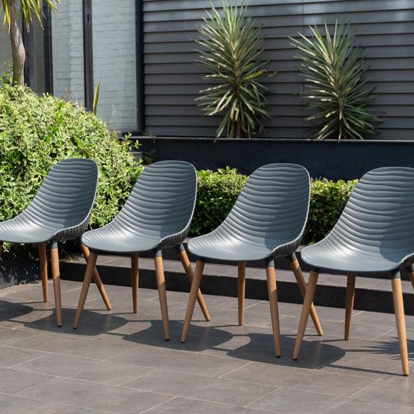 Safavieh Amazonia SandyShores 7-Piece Oval Outdoor Dining Set | International Home Miami - GENDIANOV6STRMSDGR