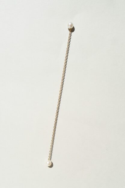Saskia Diez Long Pearl Barbelle Earring. One Piece