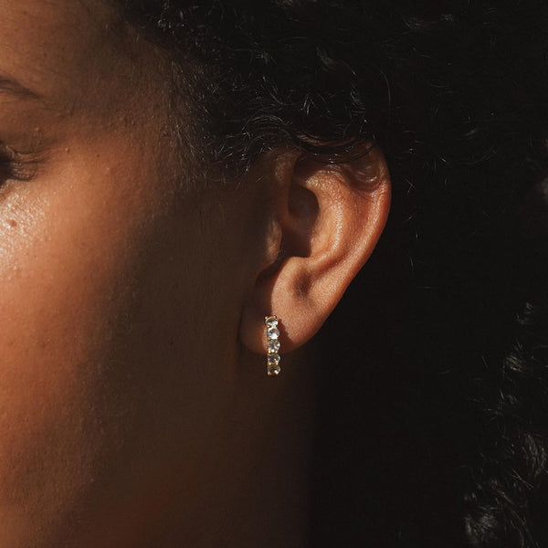 Satya Jewelry Shine With Compassion Blue Topaz Huggie Earrings