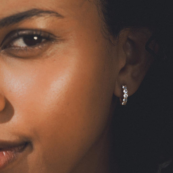 Satya Jewelry Shine With Compassion Blue Topaz Huggie Earrings