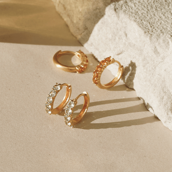 Satya Jewelry Shine With Compassion Blue Topaz Huggie Earrings