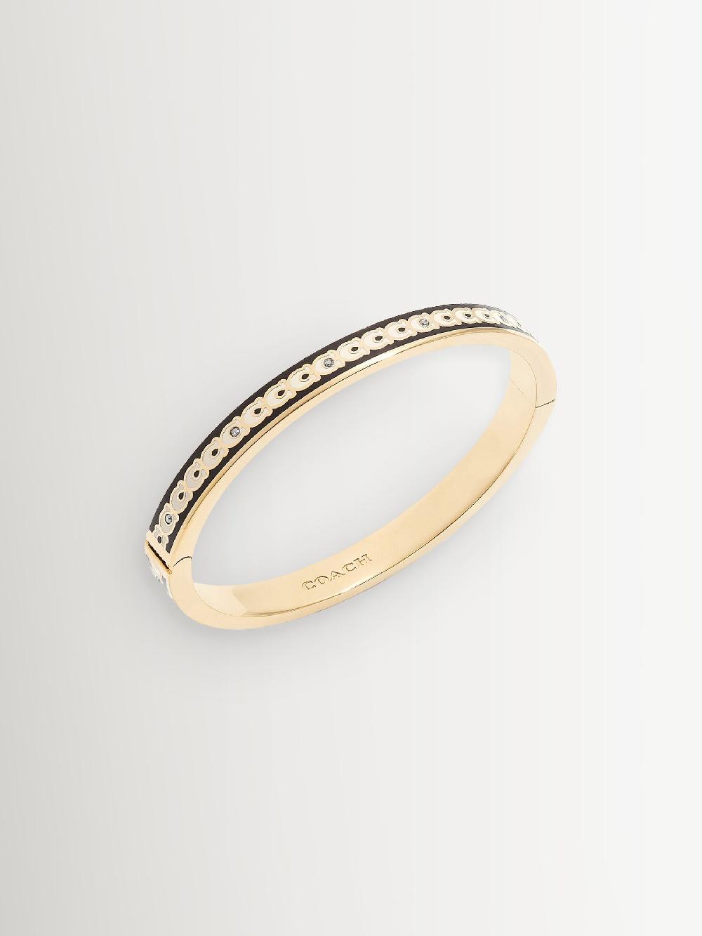 seraphine COACH Gold Tone Signature Bangle Bracelet