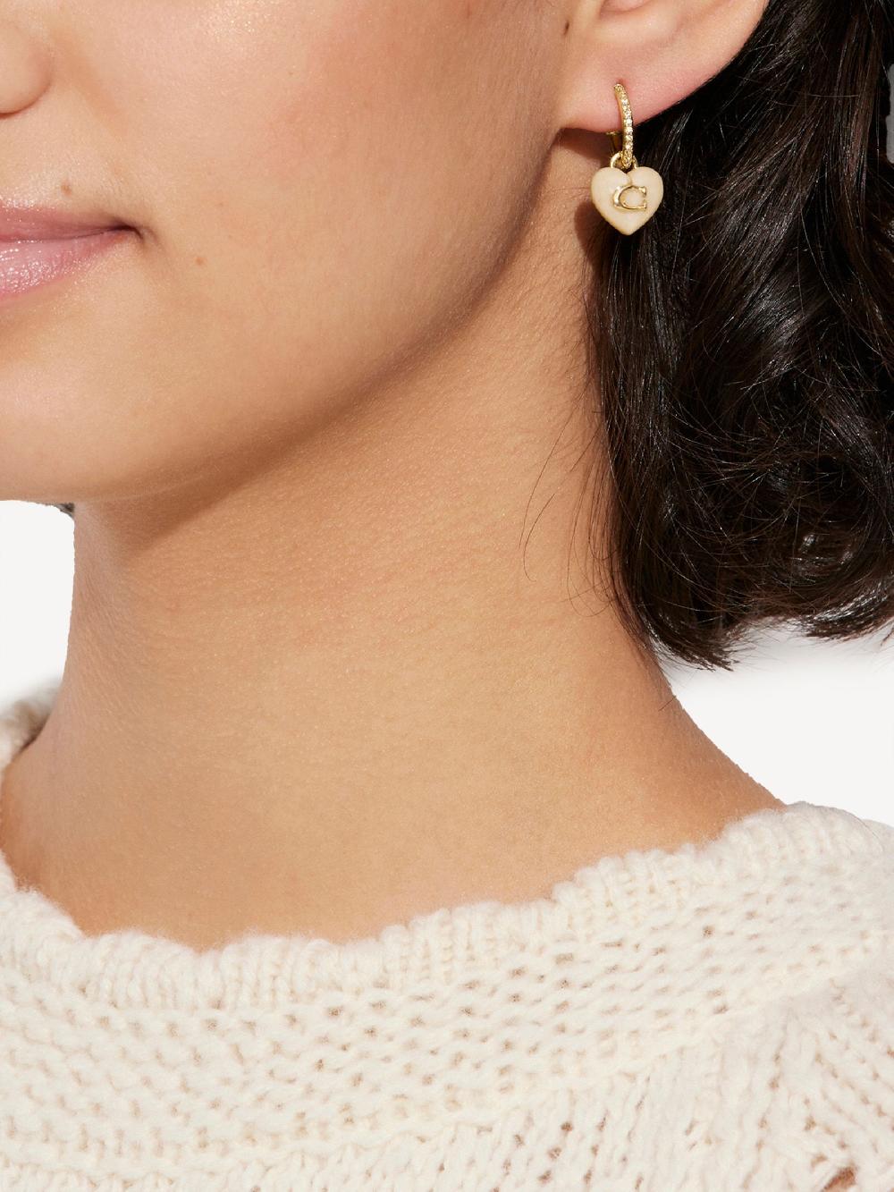 seraphine COACH Gold Tone Signature Heart Huggies Earrings