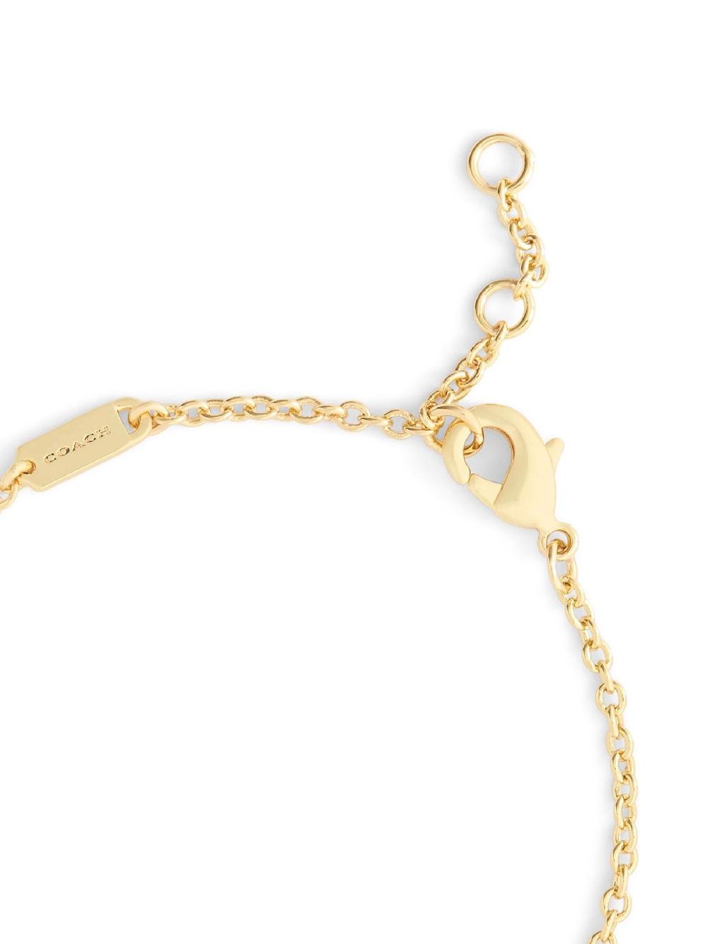 seraphine COACH Gold Tone Signature Puffy Heart Charm Bracelet