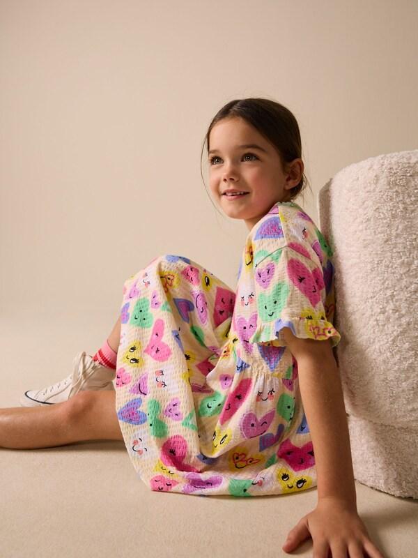 Seraphine Light Yellow Heart Print Short Sleeve Jersey Dress (3-16yrs)