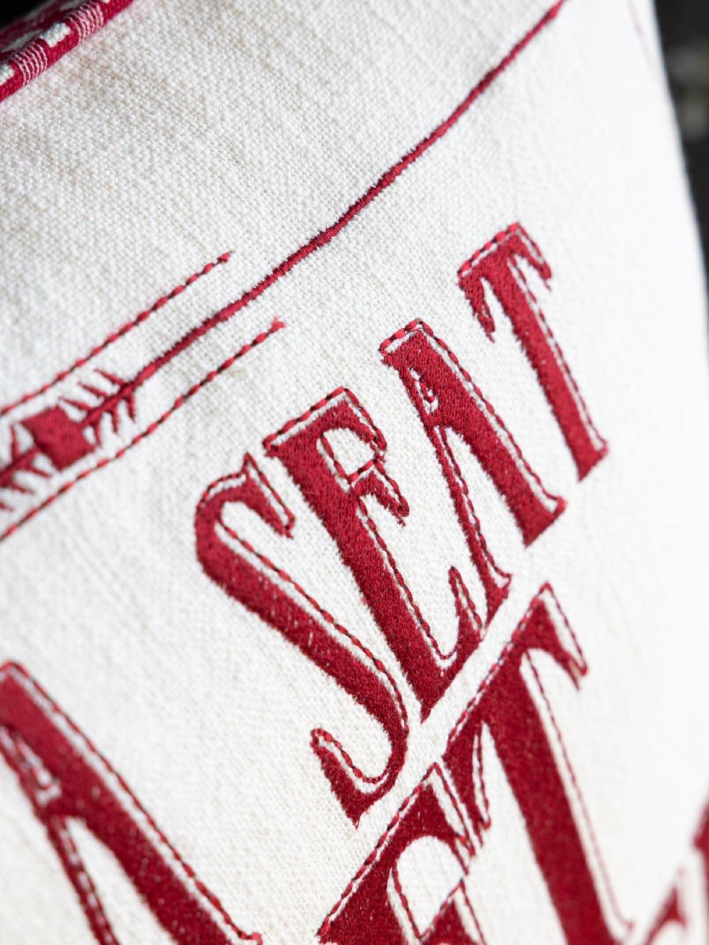 seraphine Rockett St George Natural Take A Seat Embroidered Slogan Cushion