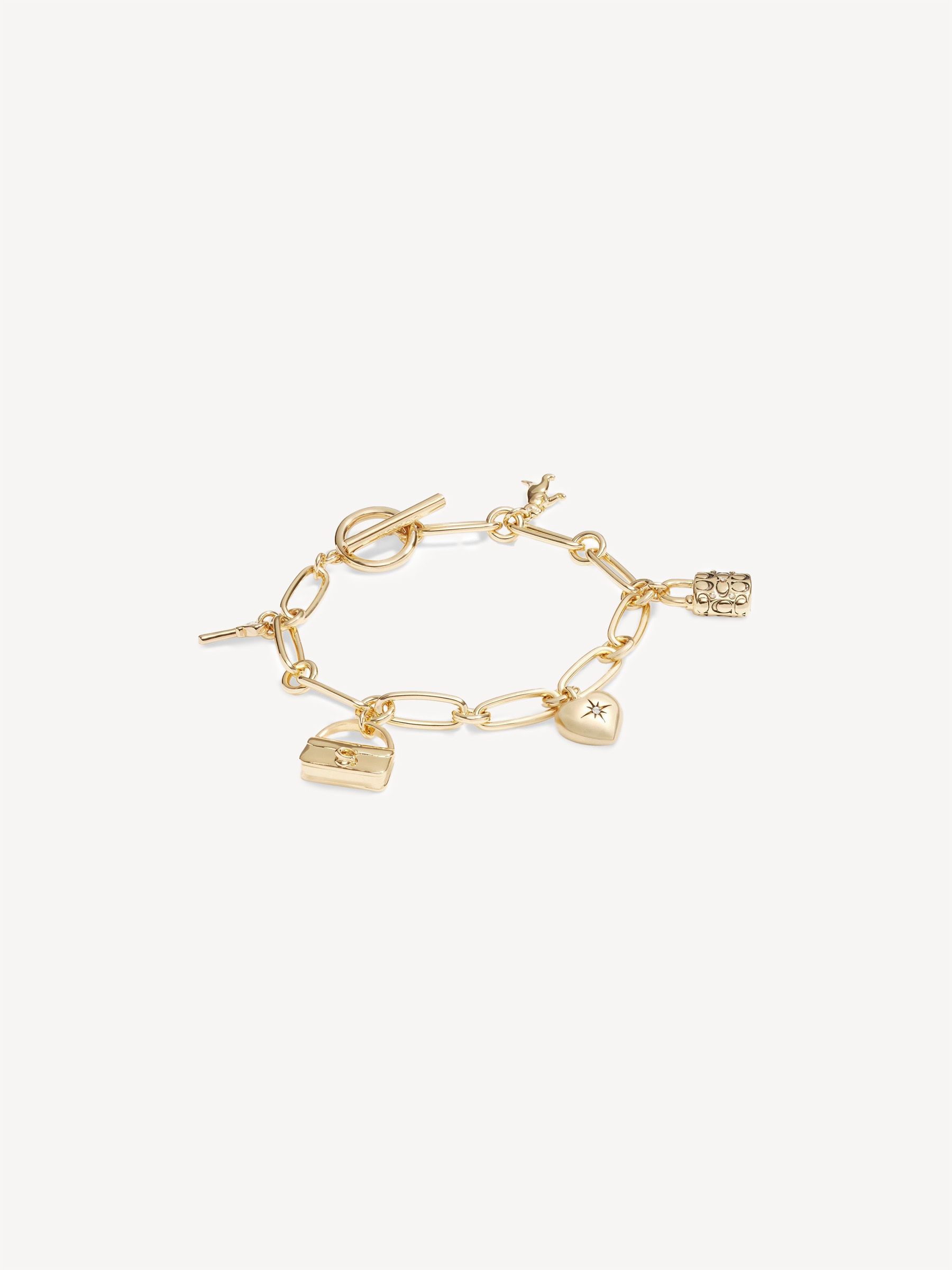 seraphine COACH Gold Tone Iconic Charm Bracelet