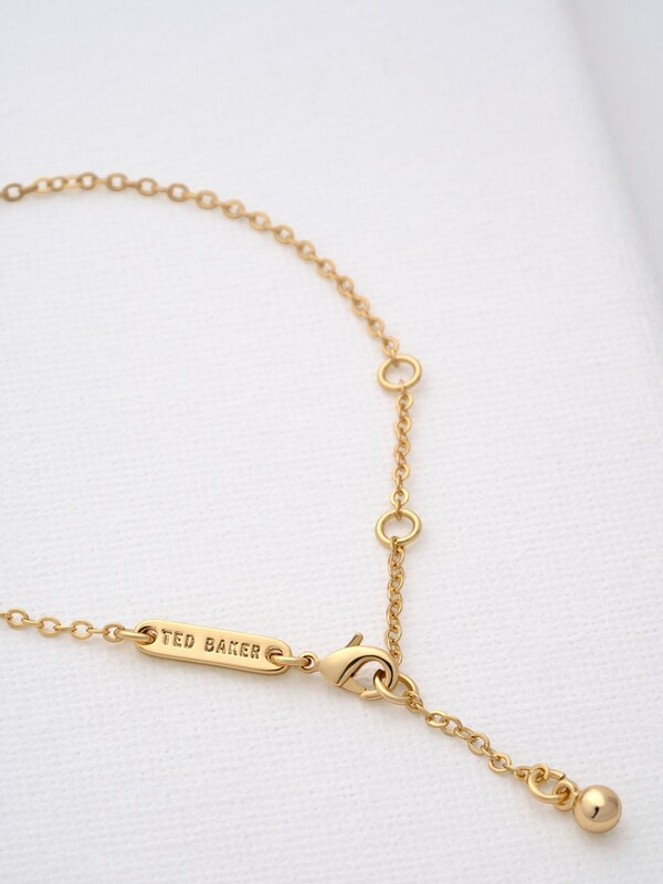 Seraphine Ted Baker Gold Tone HANSAA: Crystal Heart Adjustable Bracelet