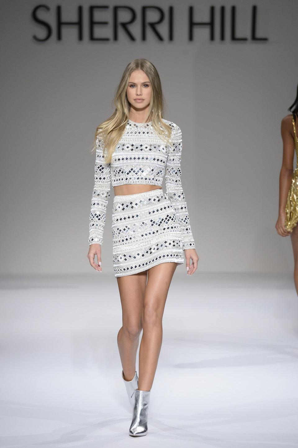 sherri hill Beaded and embellished cocktail length two piece with long sleeves high neckline open back and fitted sheath skirt