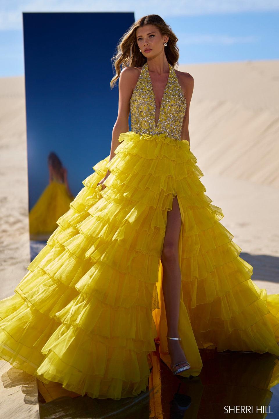 sherri hill Beaded halter ball gown with deep V-neckline and organza ruffle skirt with high slit