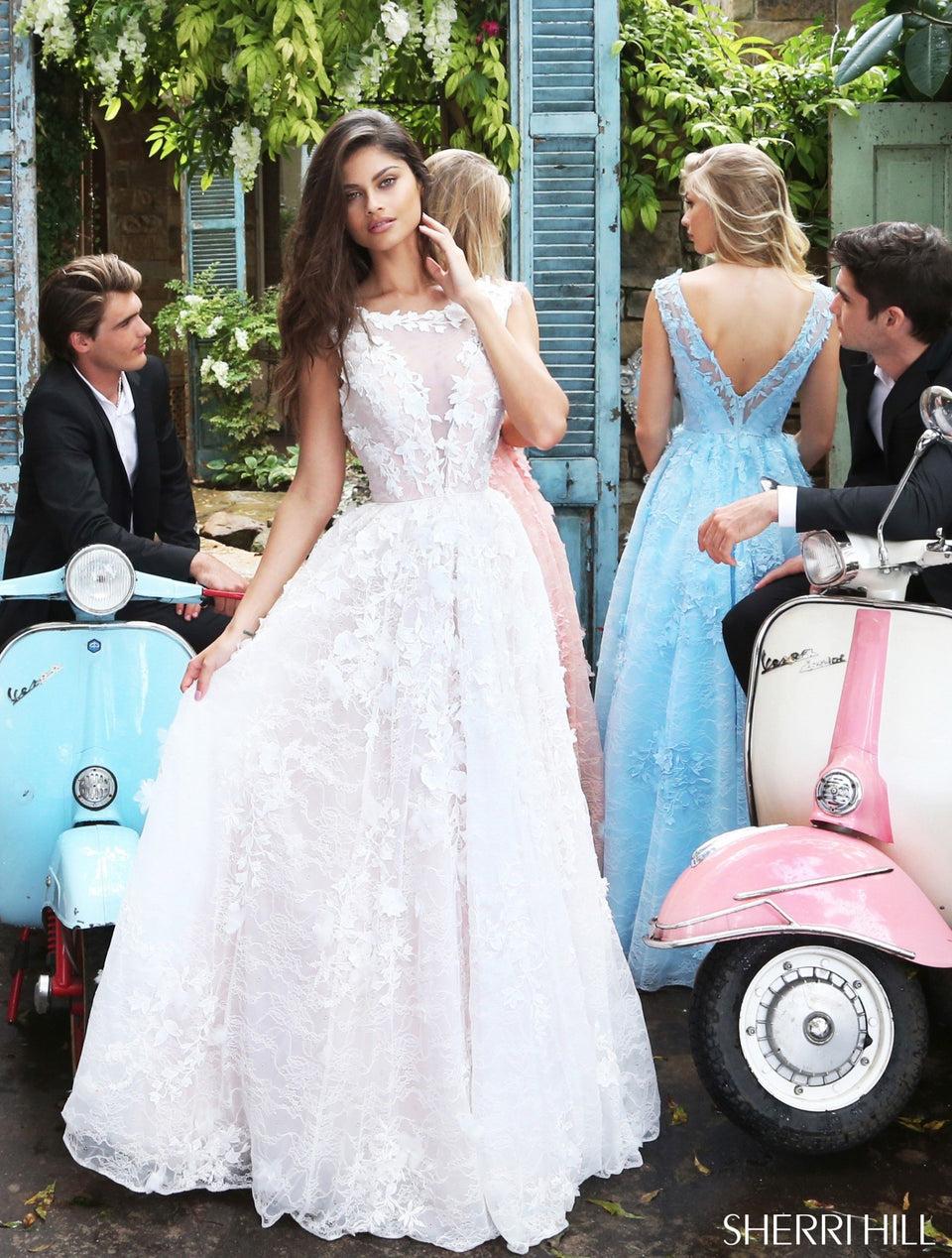sherri hill Cap sleeve lace ball gown with a ivy applique bodice and skirt