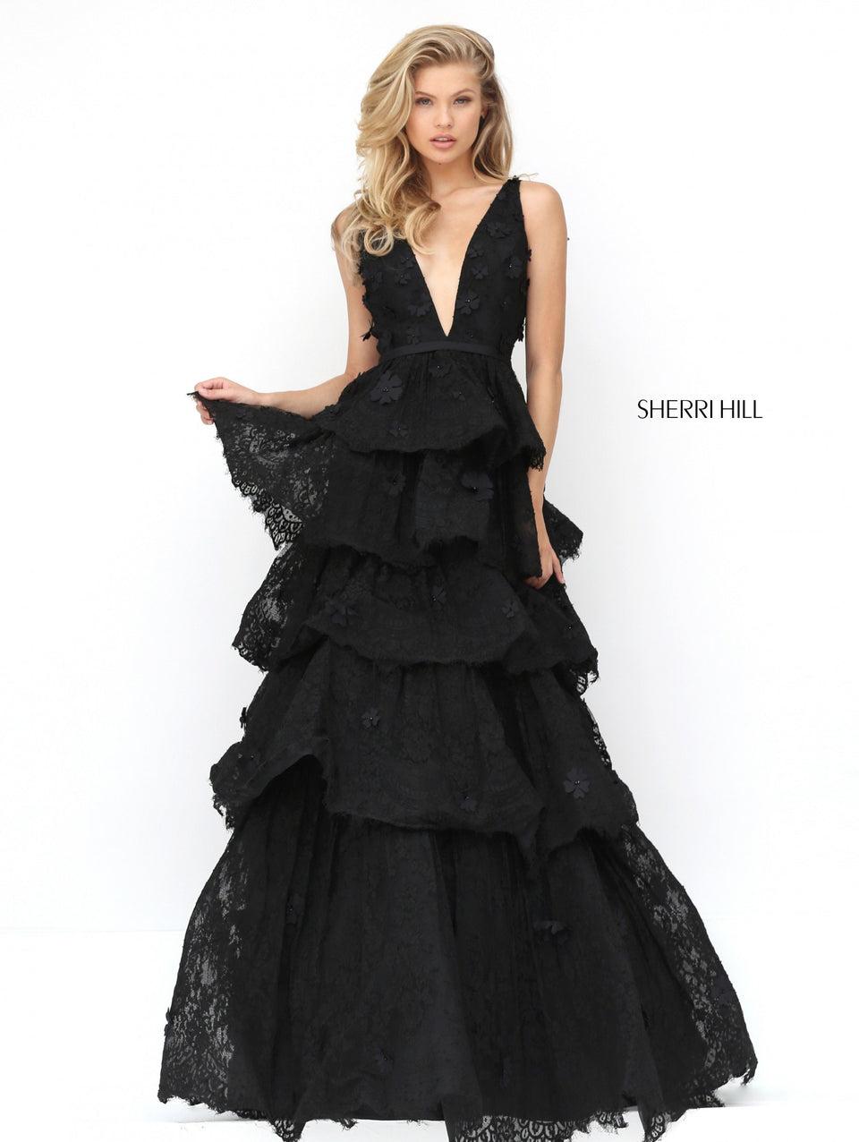 sherri hill Deep V-neck bodice with a lace tiered skirt and flower appliques