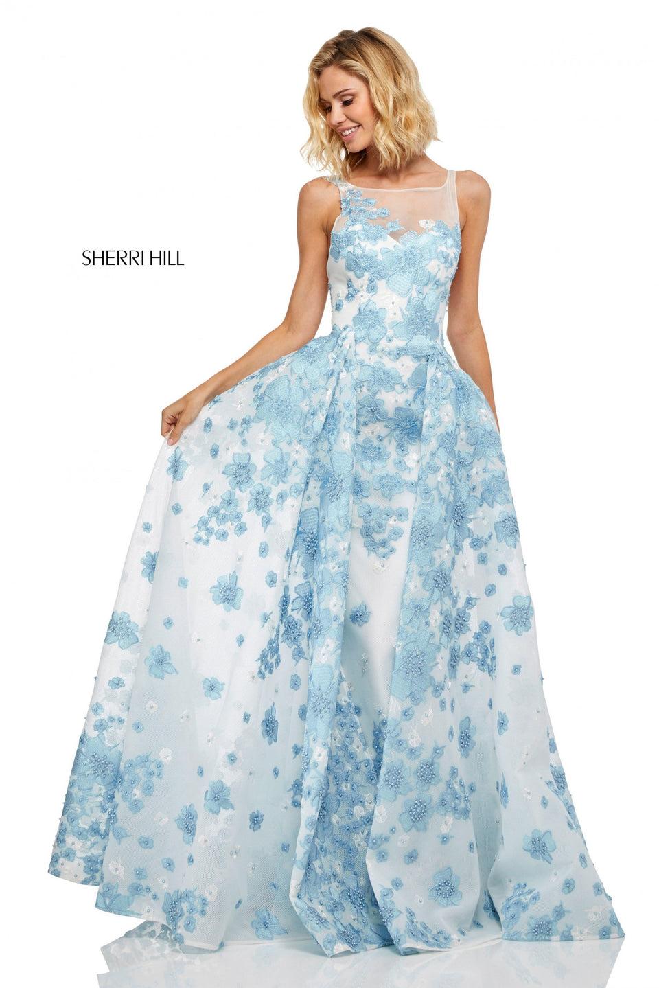 sherri hill Fitted A-line gown with over skirt and flower appliques