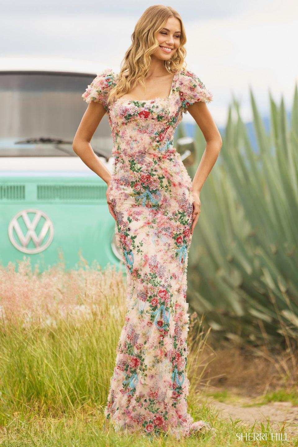 sherri hill Fitted floral print gown with floral beaded embellishments corset boning and ballon cap sleeves