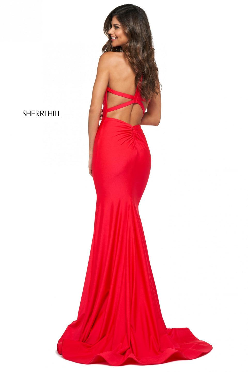sherri hill Fitted jersey gown with high cut halter style neckline strappy back and ruched lower back