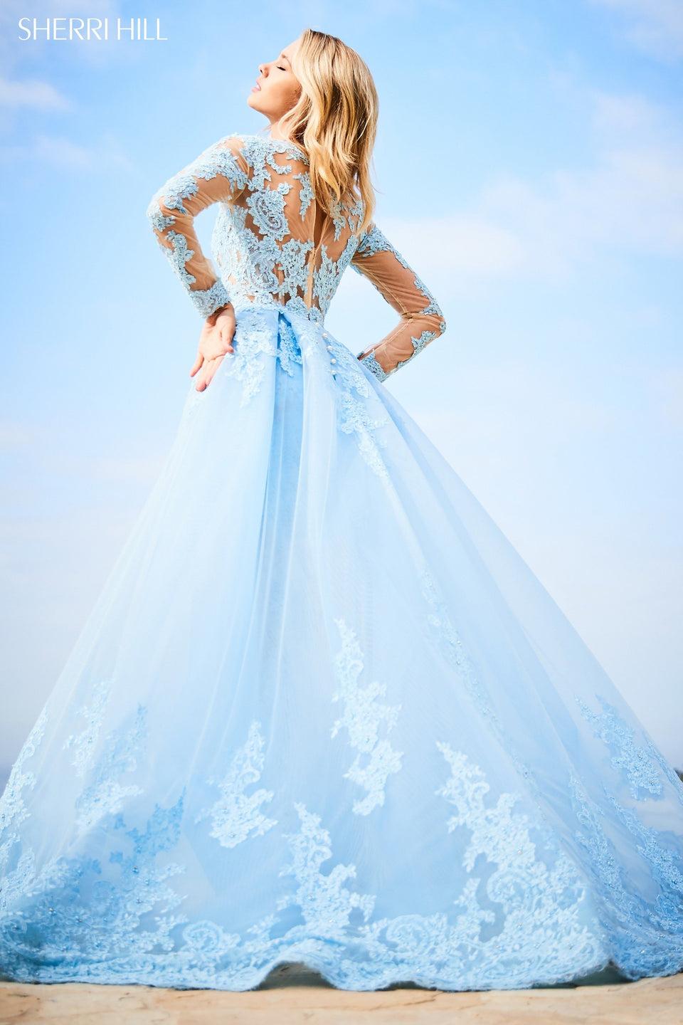 Sherri Hill Fitted Lace Gown With V Neck Bodice And Tulle Cape With Lace Appliques