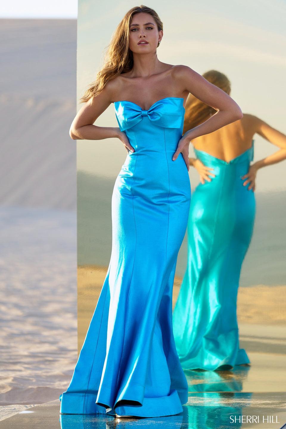 sherri hill Fitted metallic leather gown with a neckline bow