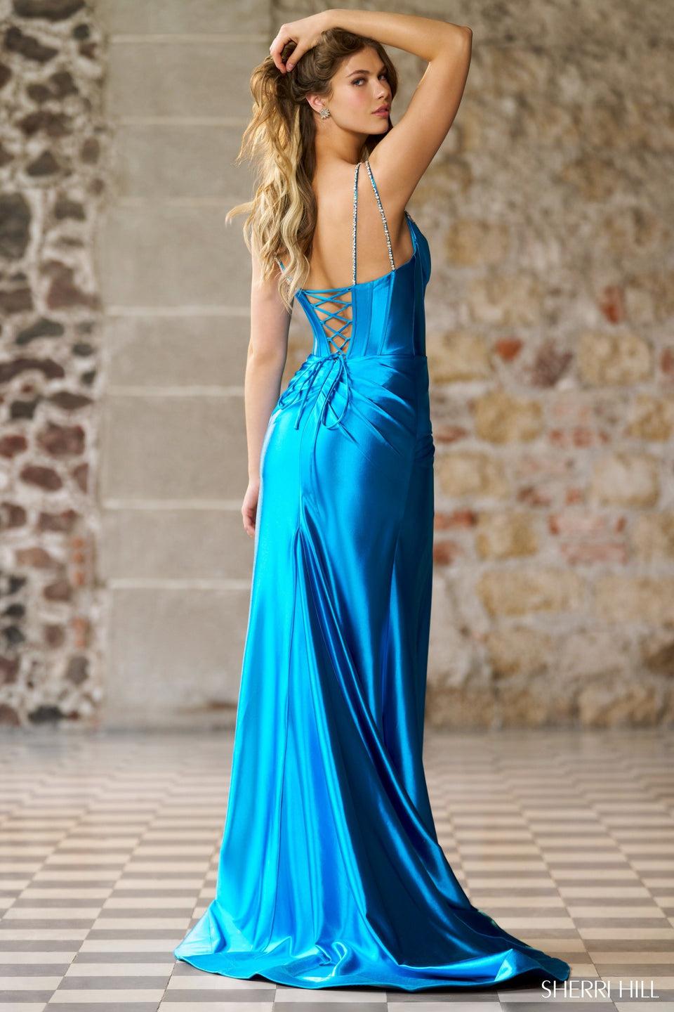Sherri Hill Fitted Silky Stretched Satin Gown With Rhinestone Embellished Deep V Neckline And A Ruched Skirt With Slit