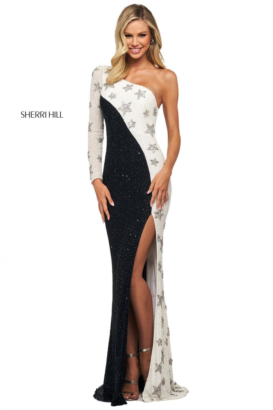 sherri hill Fitted star pattern beaded gown with skirt slit one shoulder neckline and long sleeve