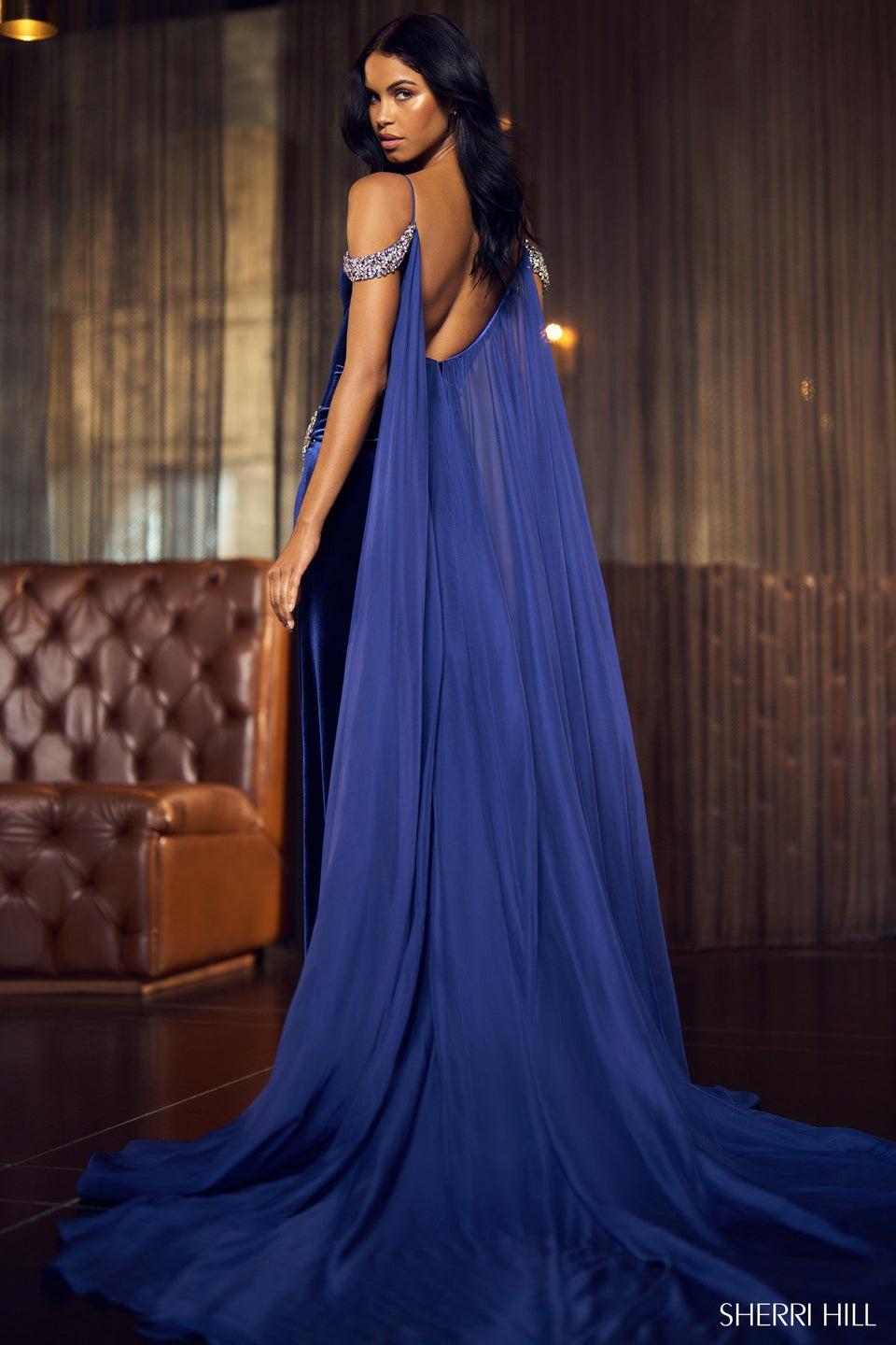 Sherri Hill Fitted Velvet Gown With A Deep V-neckline Illusion Beaded Drapping Sleeves High Skirt Slit And Chiffon Cape