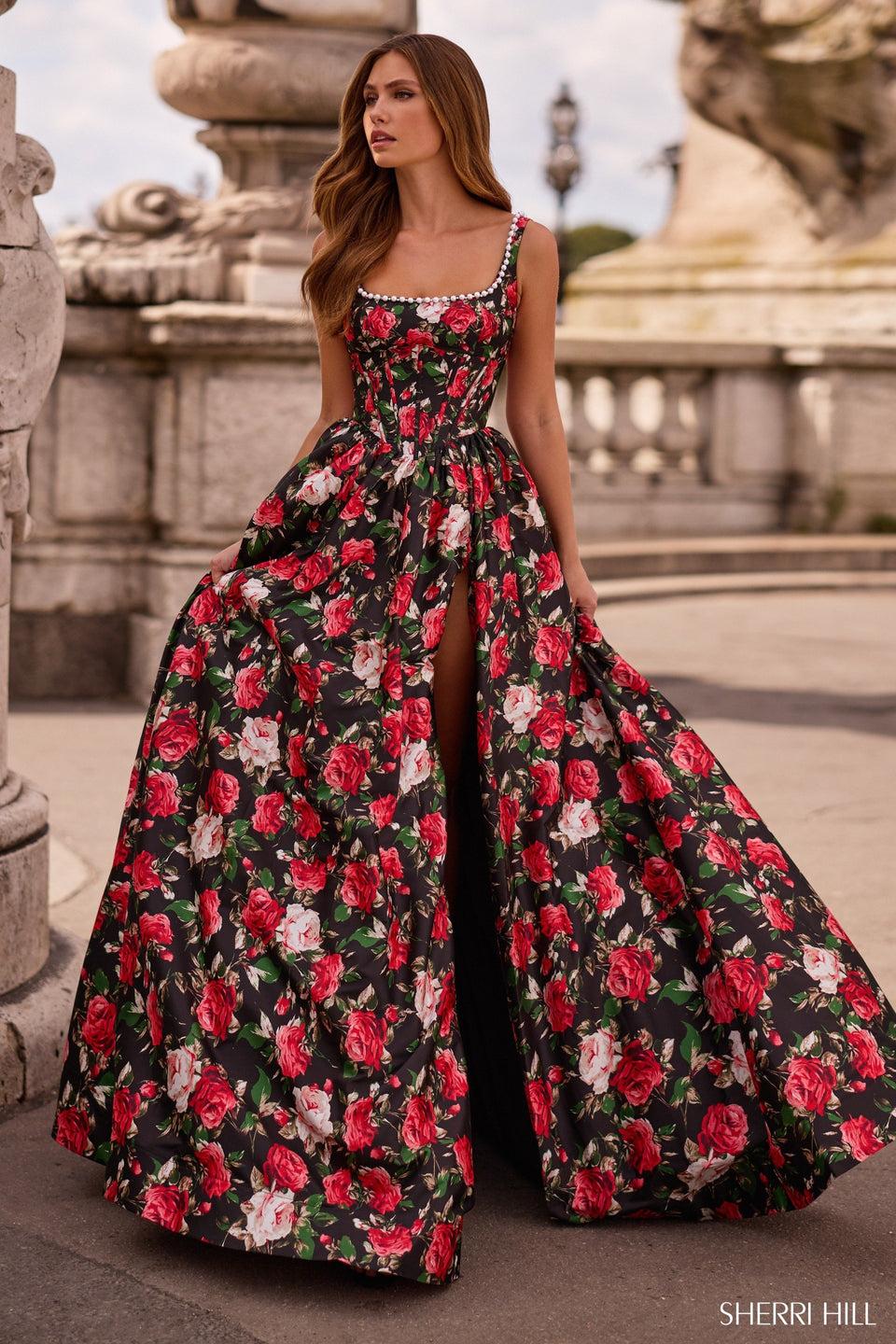 sherri hill Floral A-line gown with corset bodice pearl embellishments and a skirt slit