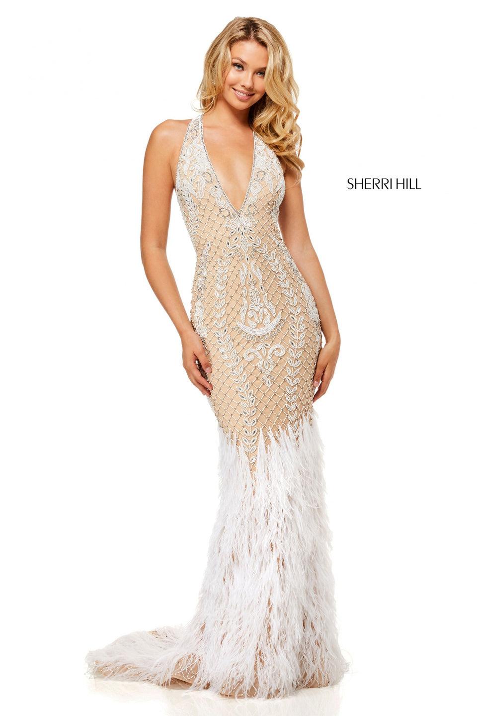 Sherri Hill Fully Beaded Gown With A Deep-V Neckline And Keyhole Back With Feather Details On Bottom Of The Skirt