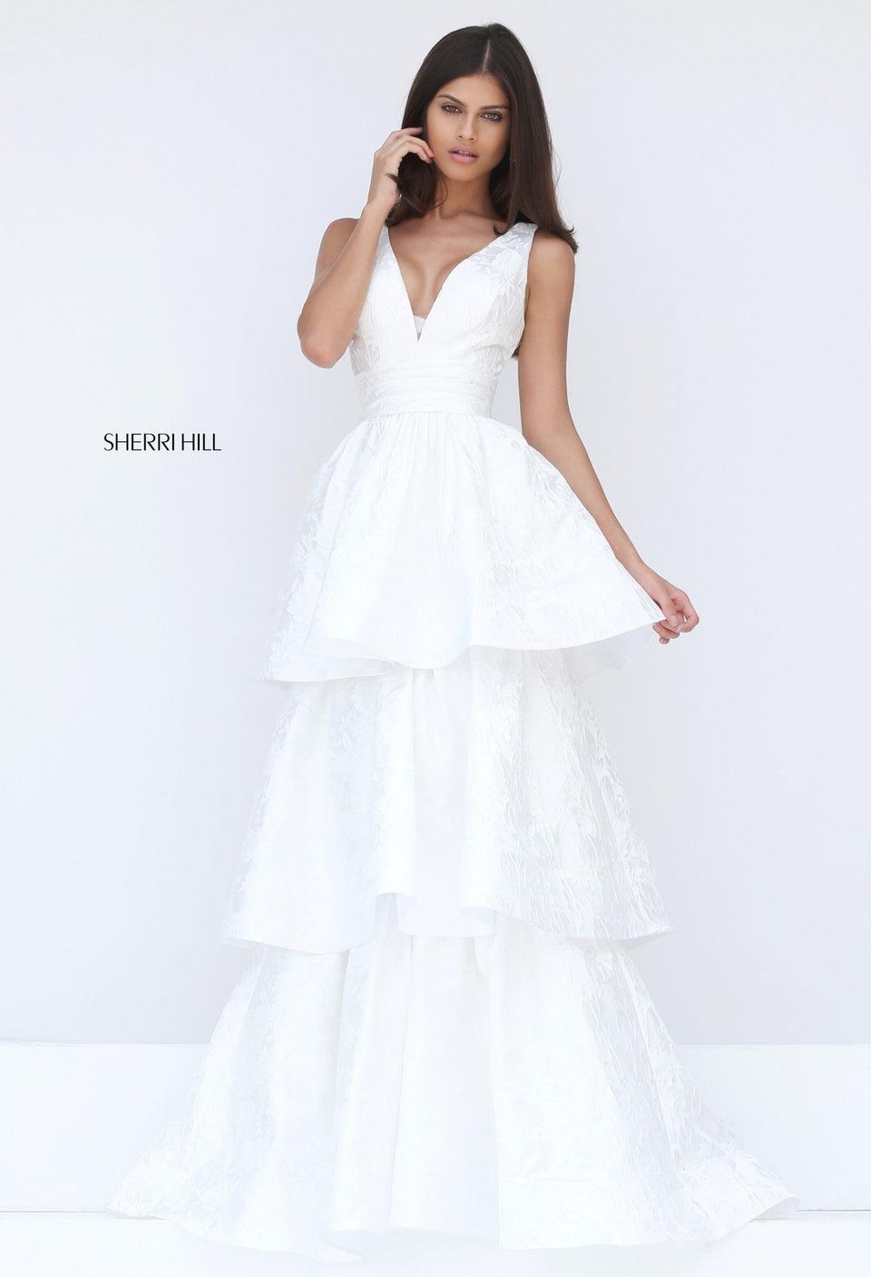 sherri hill Jacquard V-neck bodice with ruched waist band and an A-line three tiered skirt