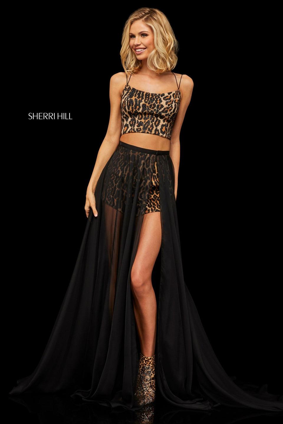 sherri hill Lace up back animal print crop top and animal print shorts with a black detachable chiffon over skirt