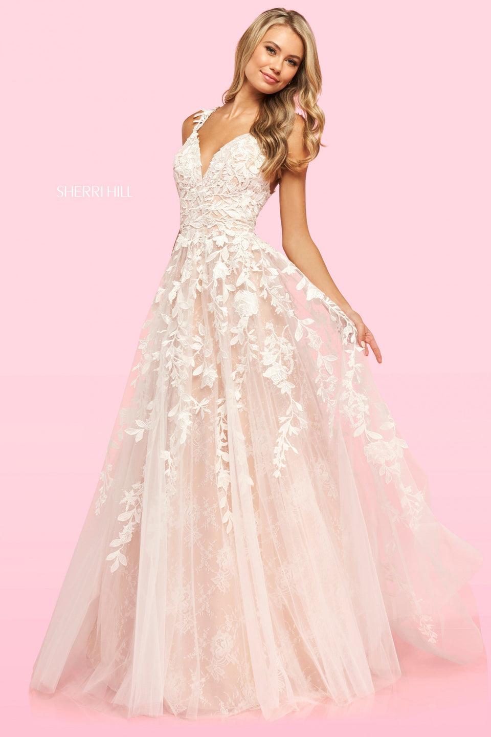 sherri hill Leaf lace appliquÃ© A-line gown with a V sweetheart neckline and lace under tulle skirt with long lace train
