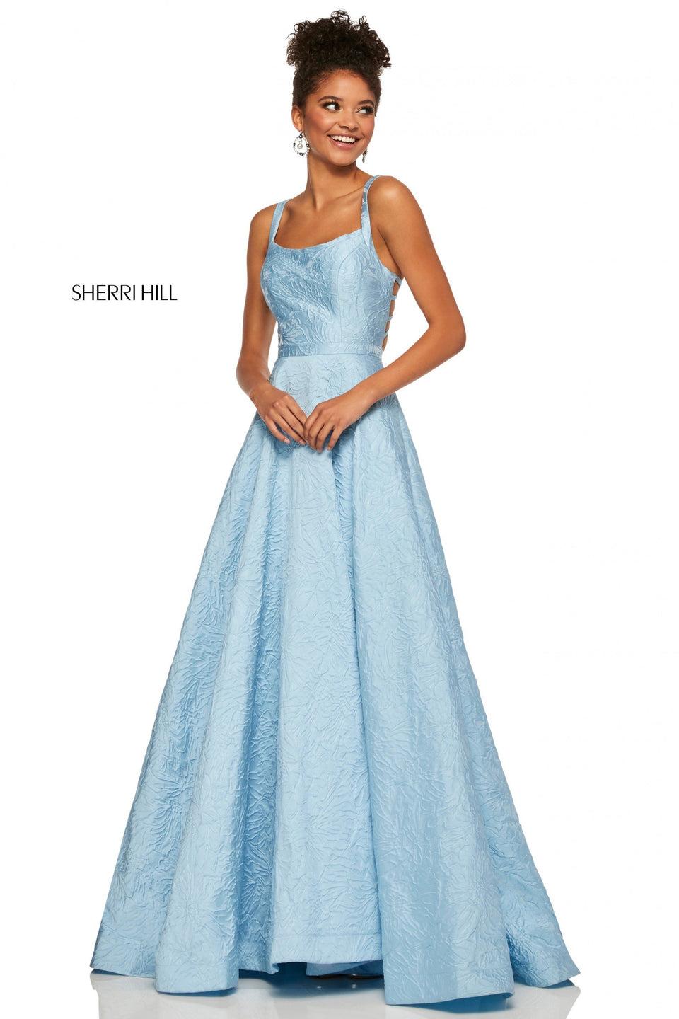 sherri hill Light blue brocade ball gown with double straps in the back